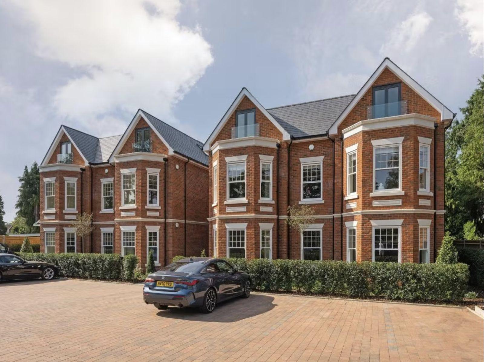 Red-brick apartments on Stoke Road, Cobham